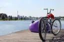 A bicycle parked by the water