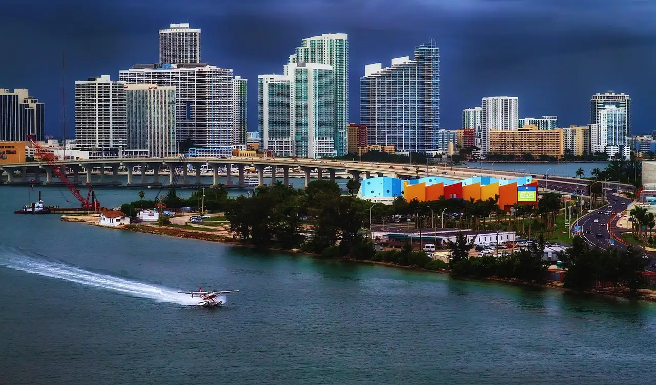 A boat crossing Biscayne Bay in front of the Miami skyline