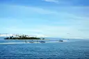Boats anchored in shallow turquoise water