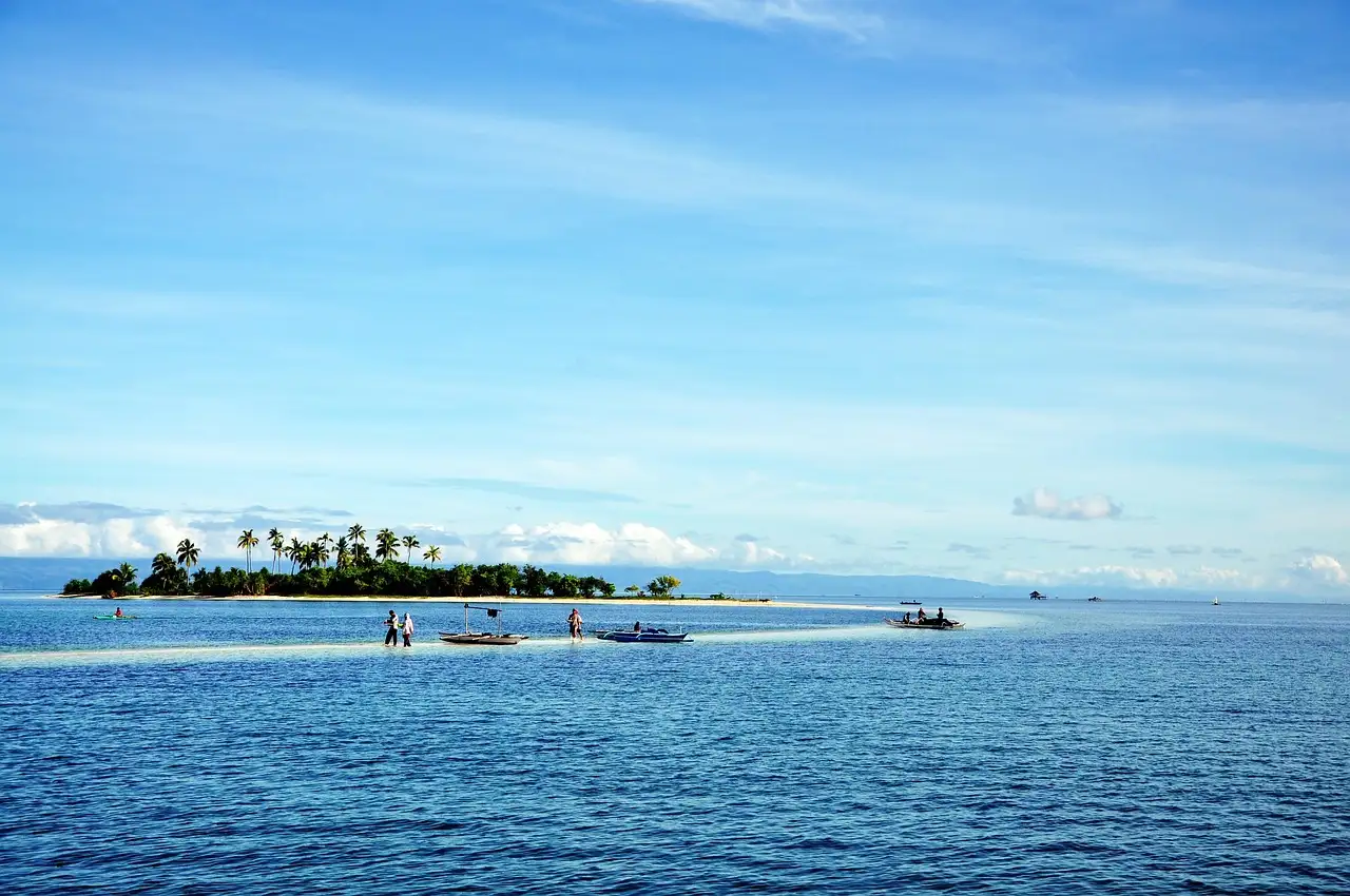 Boats anchored in shallow turquoise water