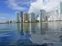 Brickell towers reflected in the bay