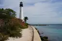 The Cape Florida Lighthouse at the tip of Key Biscayne, beside the sea wall