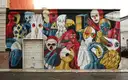 A colourful mural covering a shopfront