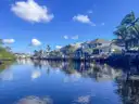 Waterfront homes with docks along a Florida canal