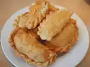Fried empanadas on a plate