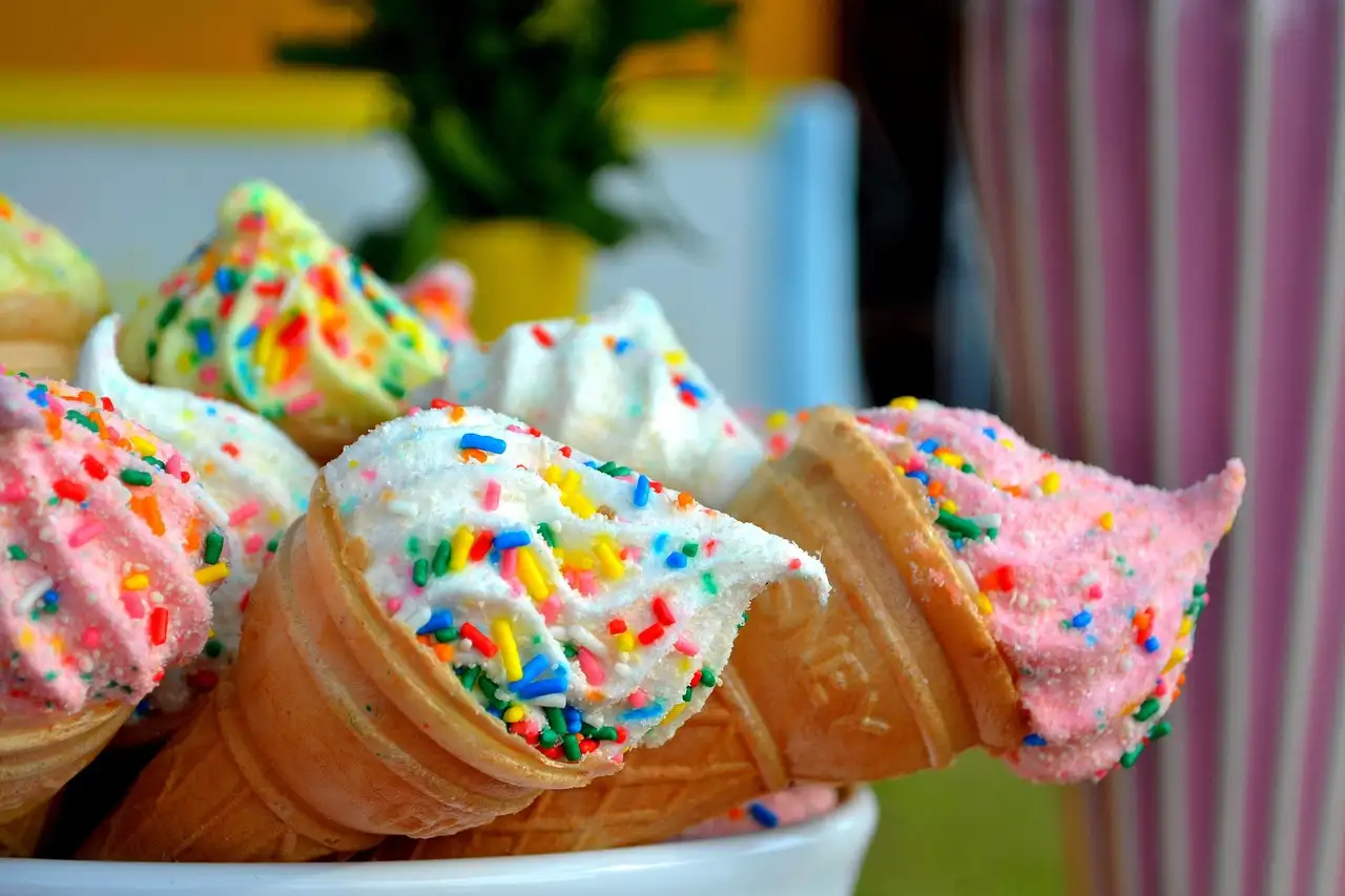 Ice cream cones covered in sprinkles
