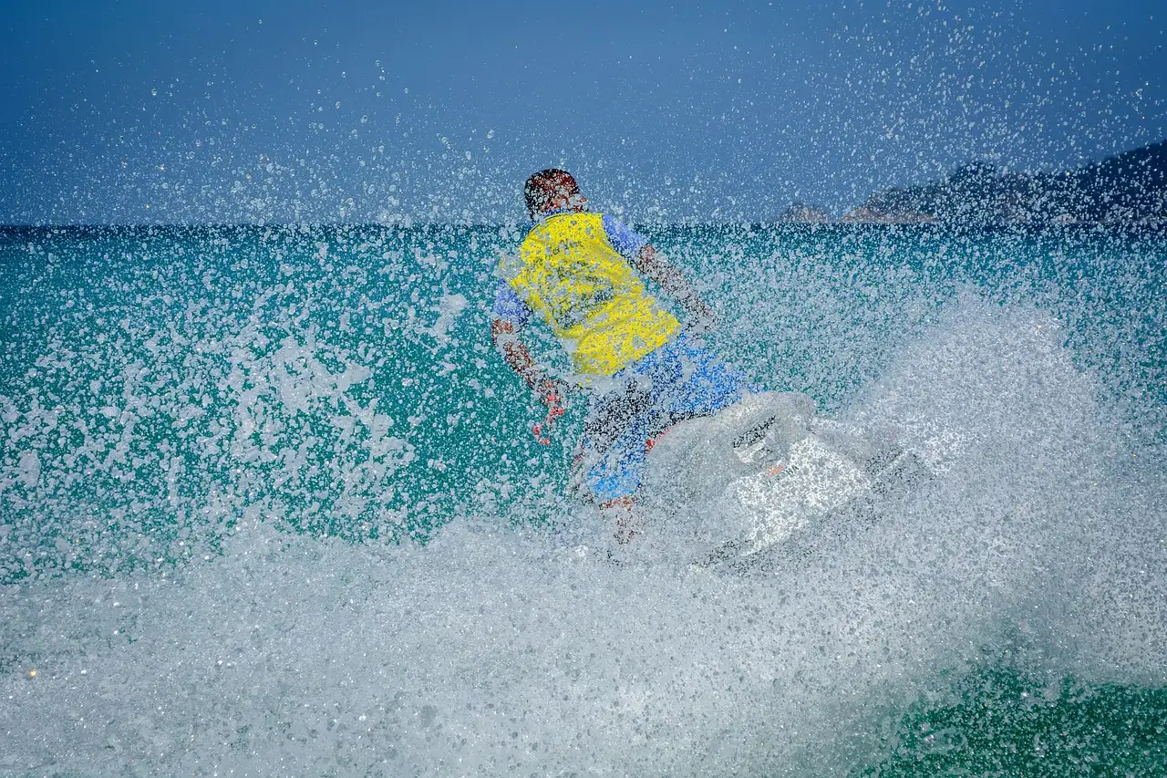 A jet ski carving a turn in turquoise water