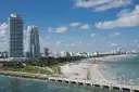 South Beach from above: the South Pointe pier, the beach and the Miami Beach towers on a sunny day