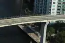 A bridge over the Miami River between downtown towers