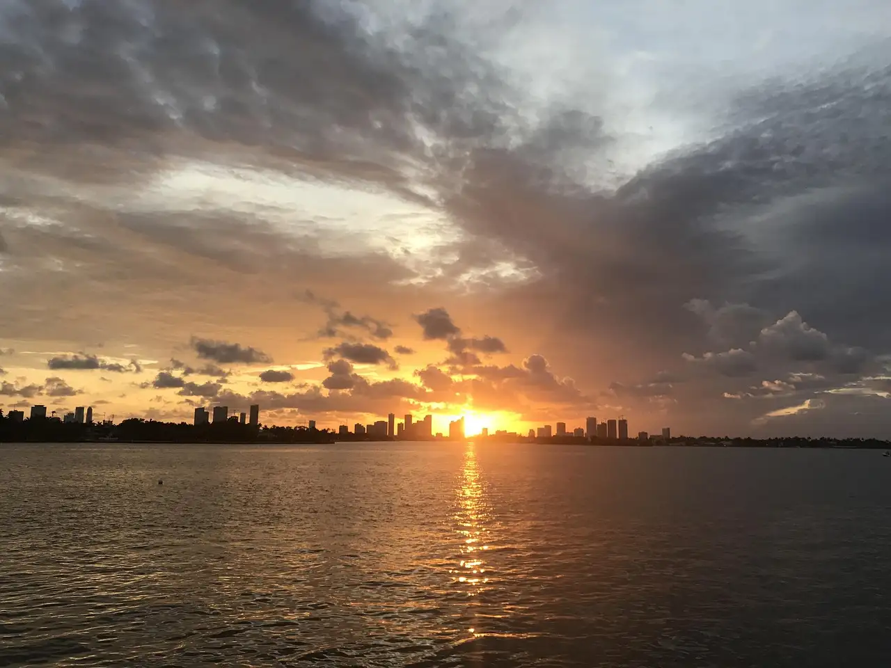 The Miami skyline under a glowing sunset