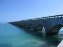 The arches of the old Seven Mile Bridge over turquoise water
