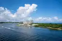 The channel at Port Everglades under big white clouds