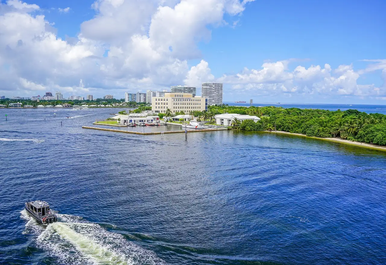 The Port Everglades inlet in Fort Lauderdale with a boat heading out