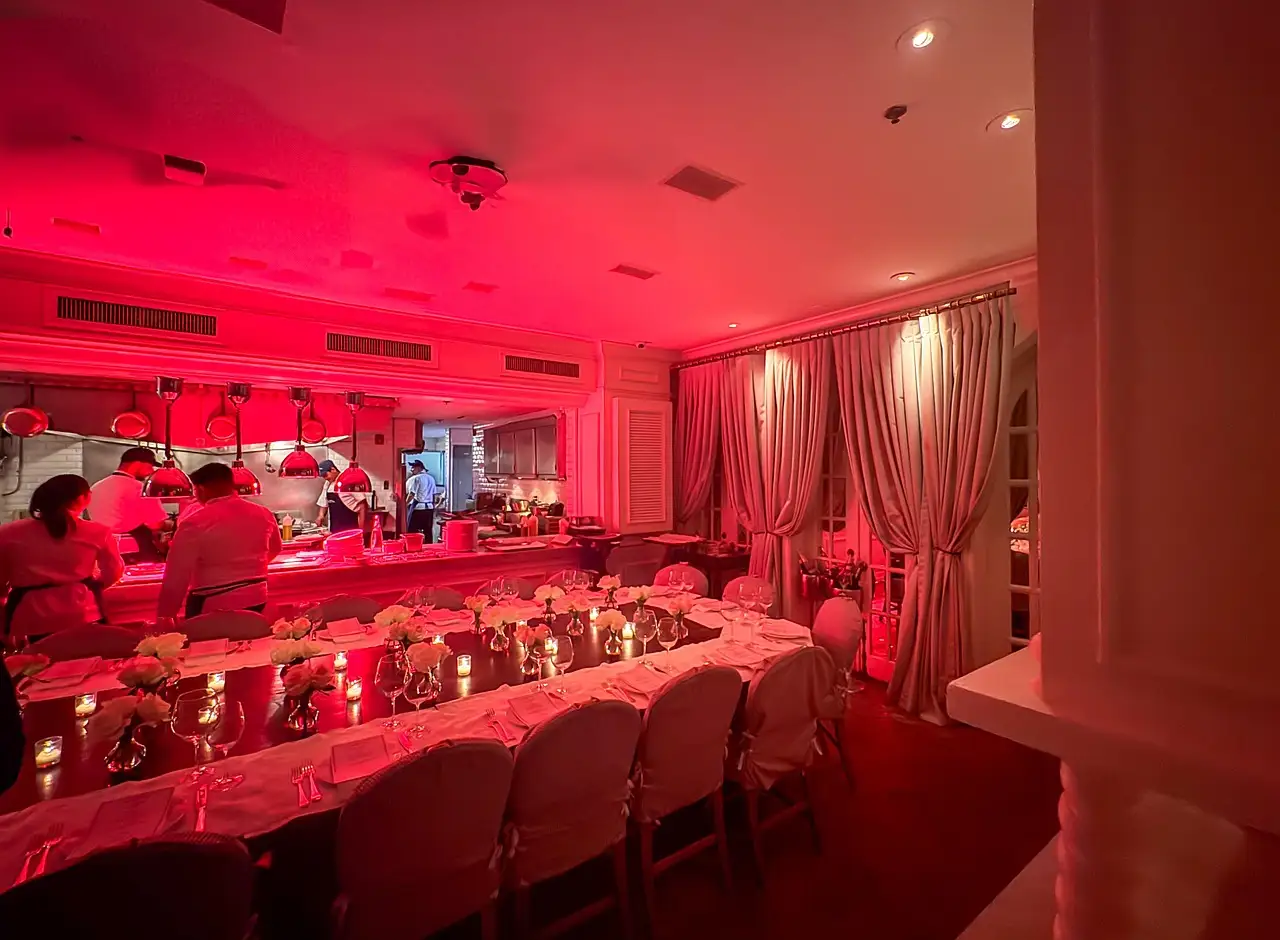Candlelit dining room with set tables at a Miami Beach restaurant