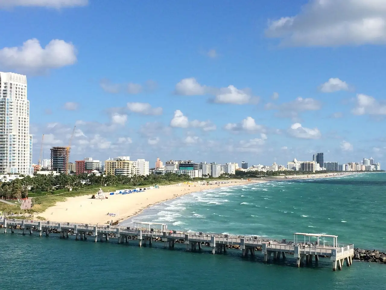 South Pointe pier and the beach of Miami Beach with high-rises behind