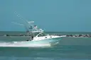 A sportfishing boat on turquoise water