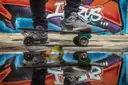 Skateboard and colourful graffiti mural in Miami street art district