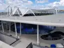 Phillip and Patricia Frost Museum of Science in Miami with its white canopy over the aquarium