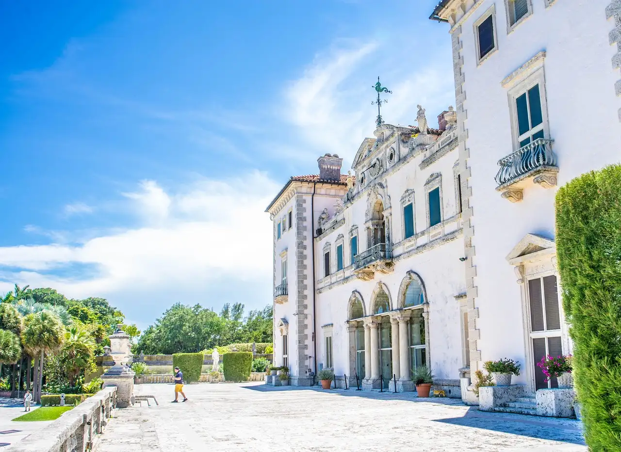 Sunlit white facade of Vizcaya Museum and Gardens in Miami