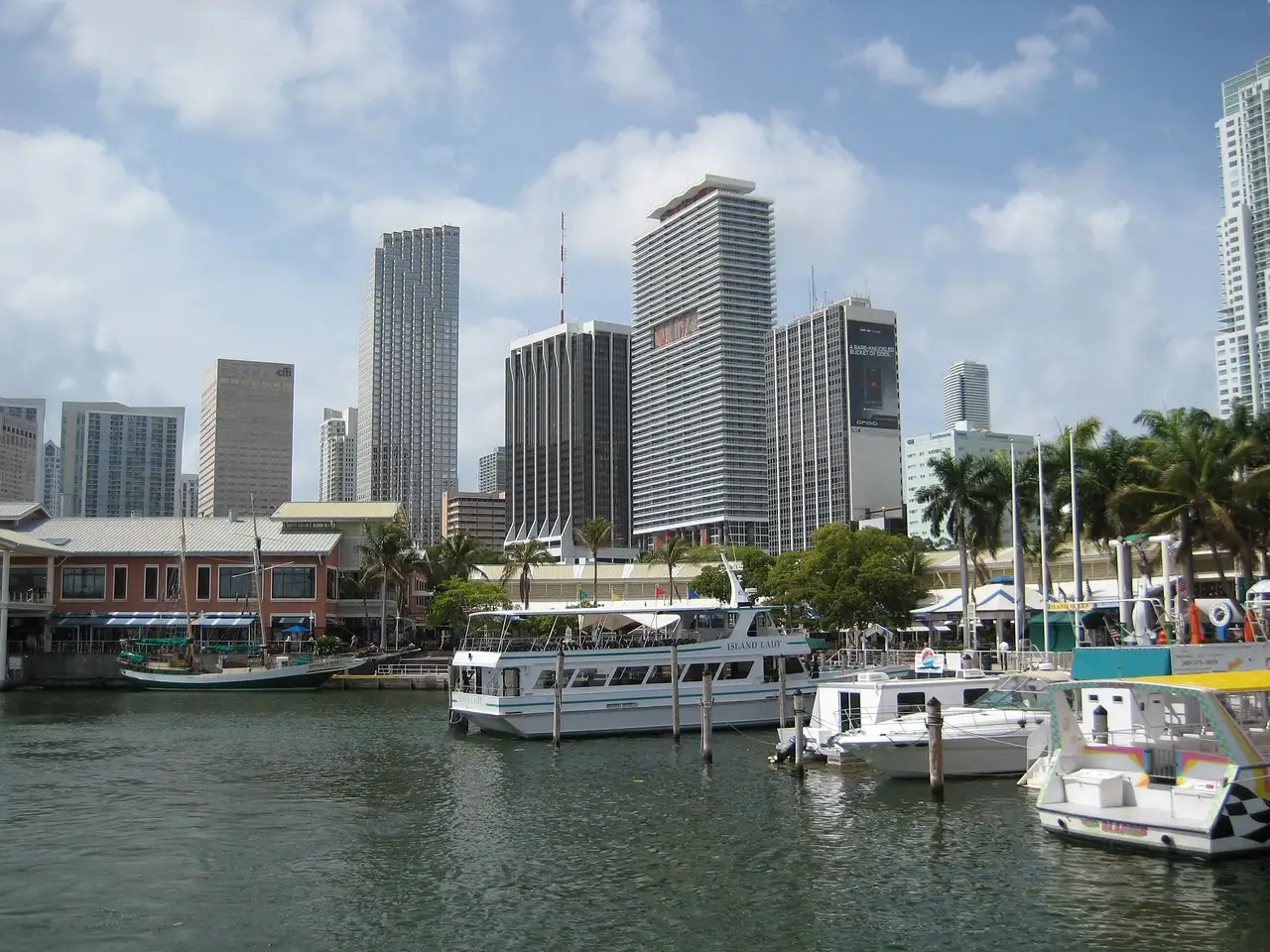 Tour boats and water taxis moored at the Bayside marina on Biscayne Bay, Miami