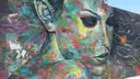A large painted face mural in Wynwood